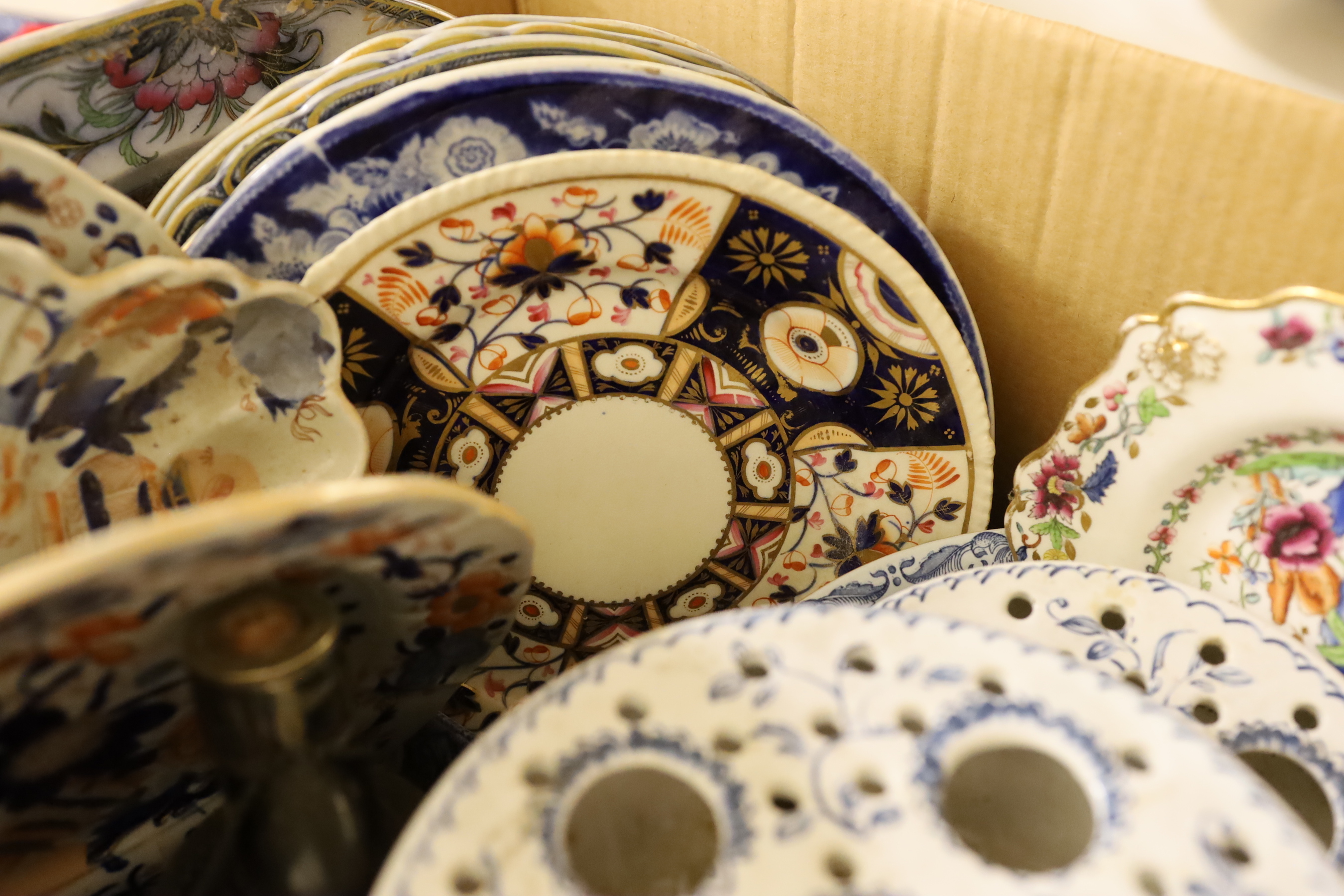 A collection of mixed ceramics including ironstone and Rörstrand Ostindia together with two decanters with plated mounts and labels, some museum reproductions